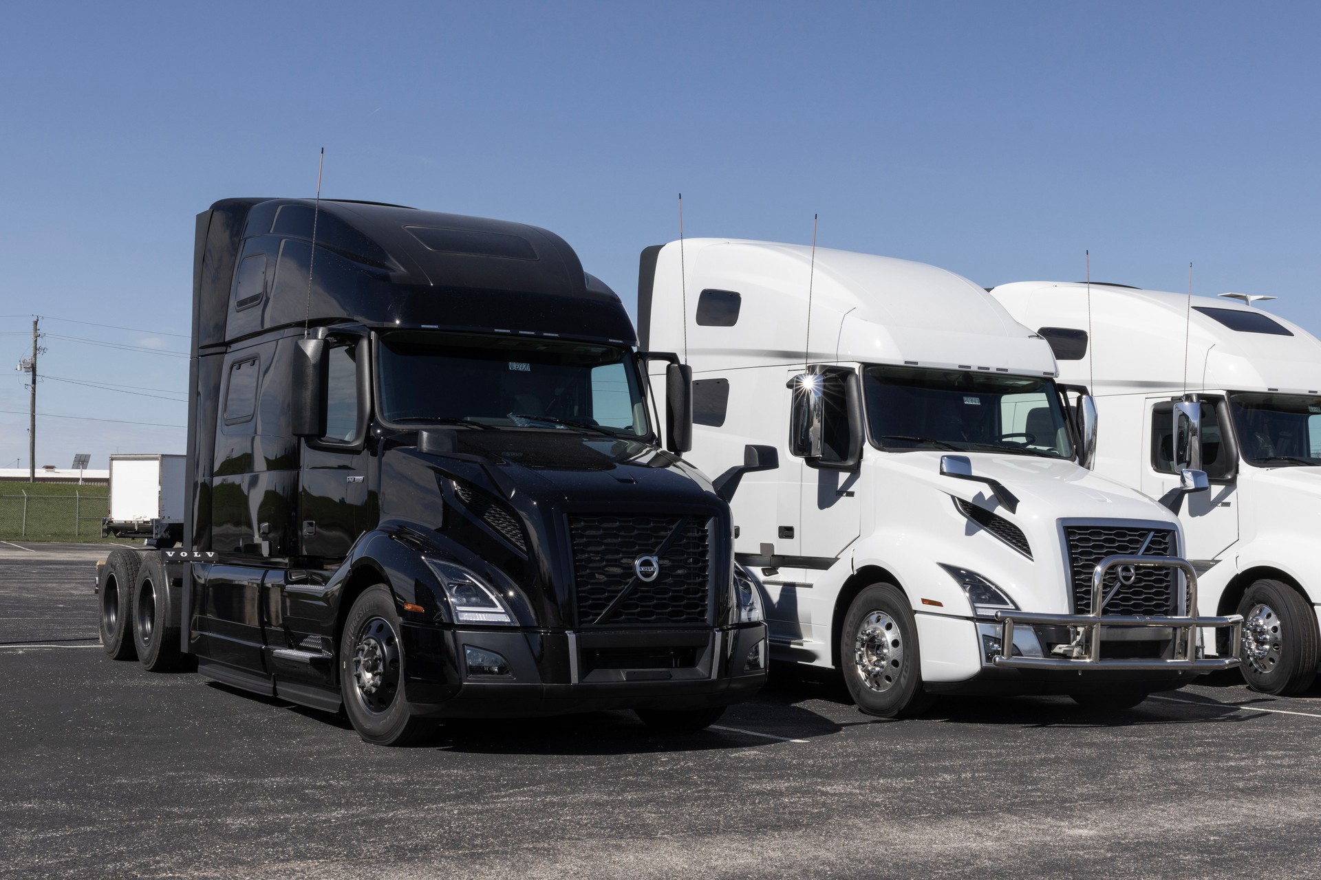 Volvo Semi Tractor Trailer Big Rig Truck display at a dealership. Volvo Trucks supplies complete transport solutions.