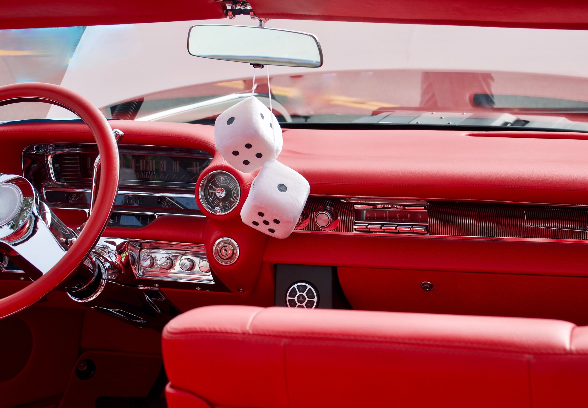 Vintage convertible hot rod with red leather interior